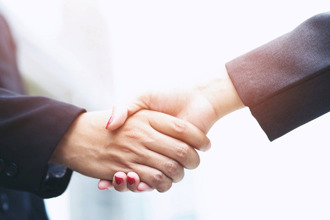 Man and Woman Shaking Hands 
